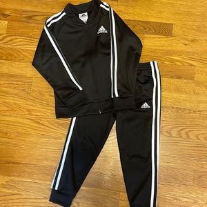 Black and white stripe adidas track suit